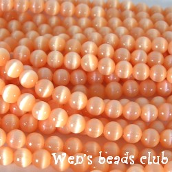 Cat's eye beads, round, Lt. Peach, 5mm, 16 inch strand.