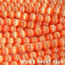 Cat's eye beads, round, Peach, 6mm, 16 inch strand.