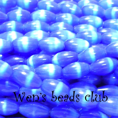 Cat's eye beads, Rice Beads, Sapphire blue,5x8mm, 16 inch strand.
